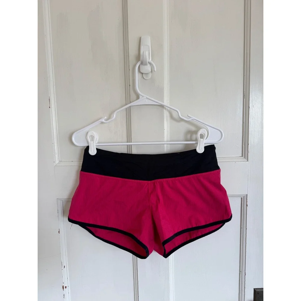 Lululemon pink & black shorts size 4.